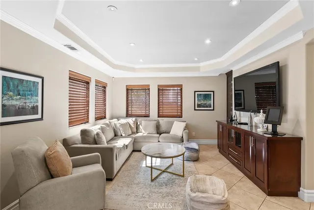 a kitchen with stainless steel appliances a sink a stove and a wooden floor