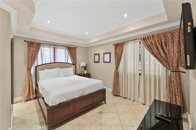 a kitchen with a refrigerator and a sink