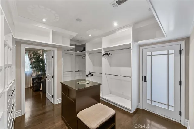 a bathroom with a toilet sink and shower