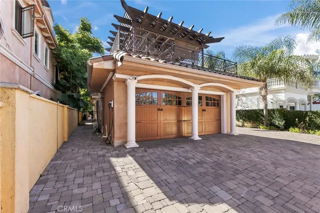 a view of a backyard with potted plants