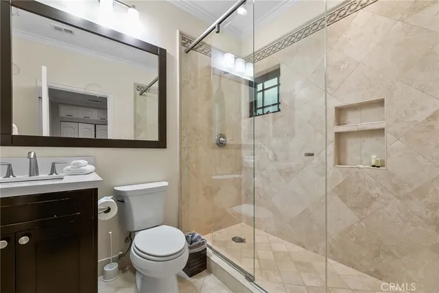 a room with furniture and a flat screen tv