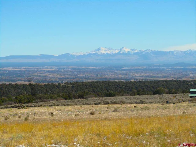a view of a lake with sunset view