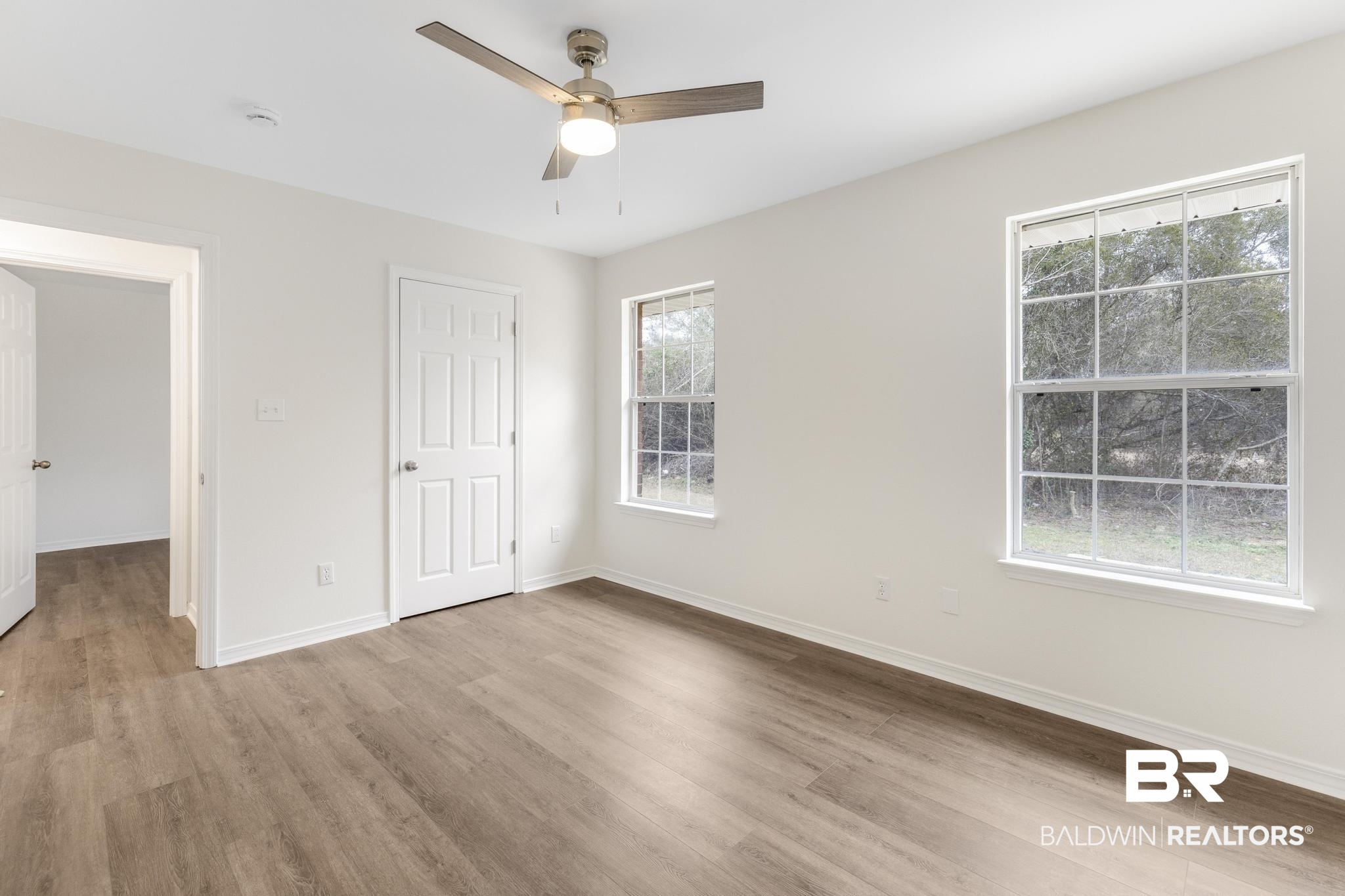 16330 Absalom Street Foley, AL 36535 - Photo 35 of 42 Unfurnished bedroom with ceiling fan and light hardwood / wood-style flooring