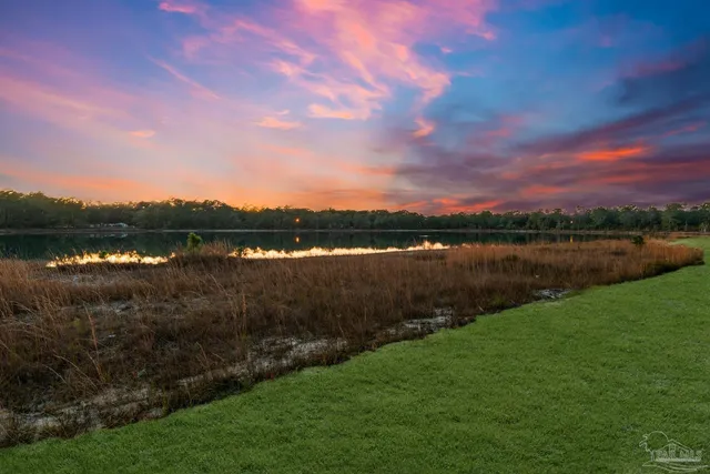 a view of a lake from a yard