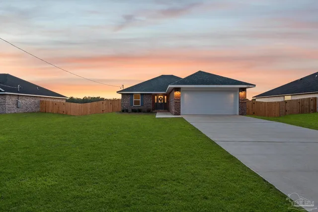 a house view with a garden space