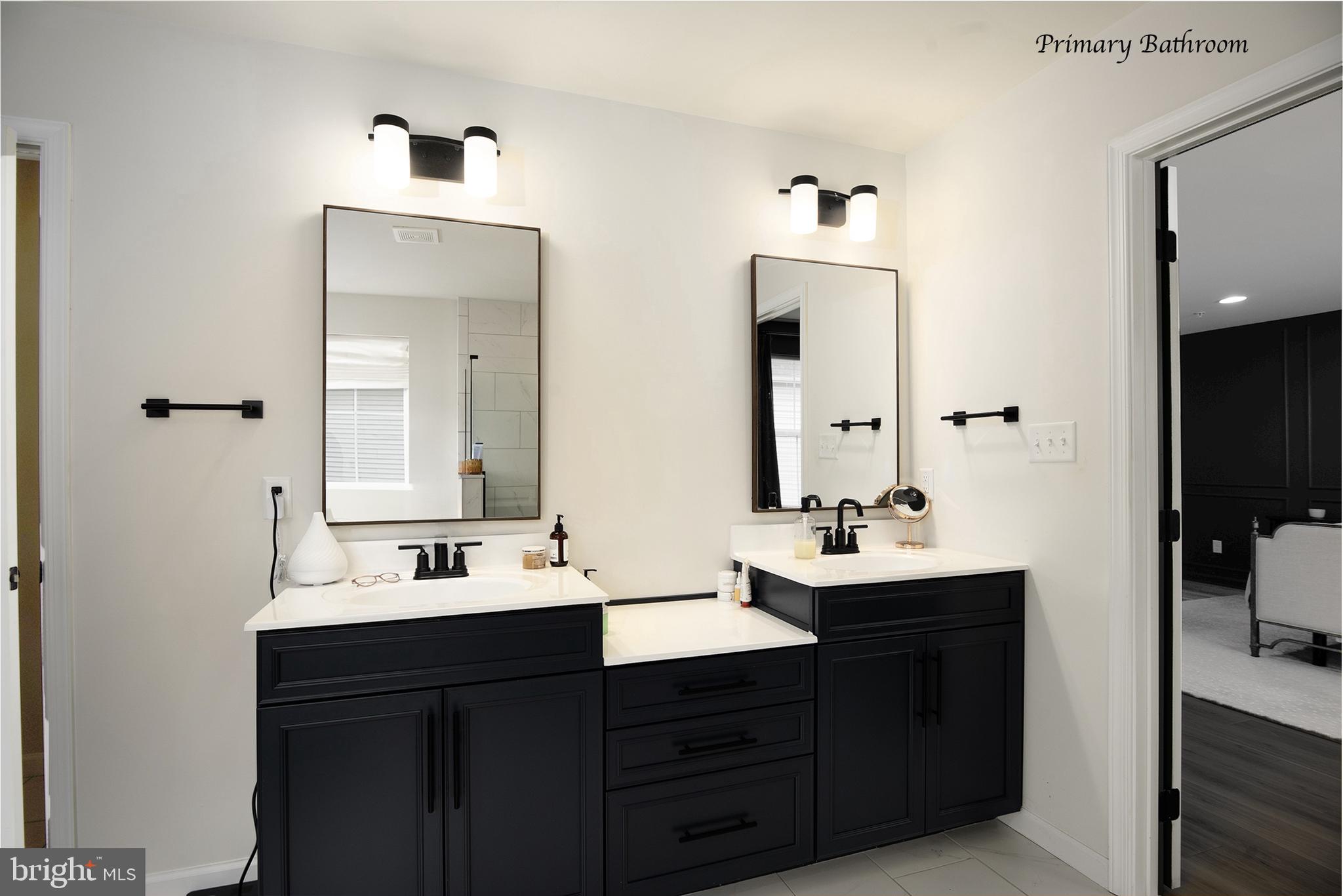 194 Cool Springs Road North East, MD 21901 - Photo 25 of 39 a bathroom with double vanity sinks and mirror