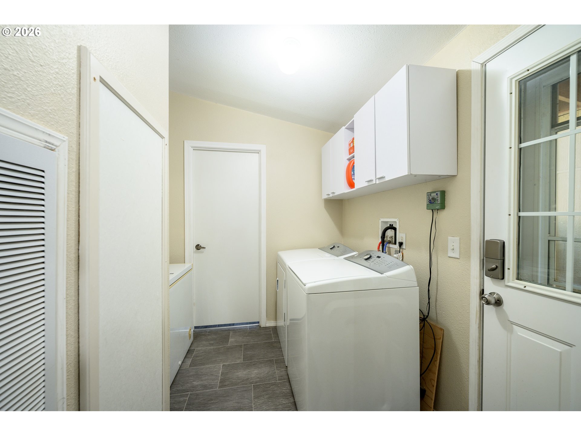 1282 3rd Street, Unit 83 Lafayette, OR 97127 - Photo 12 of 45 a utility room with closet dryer and washer