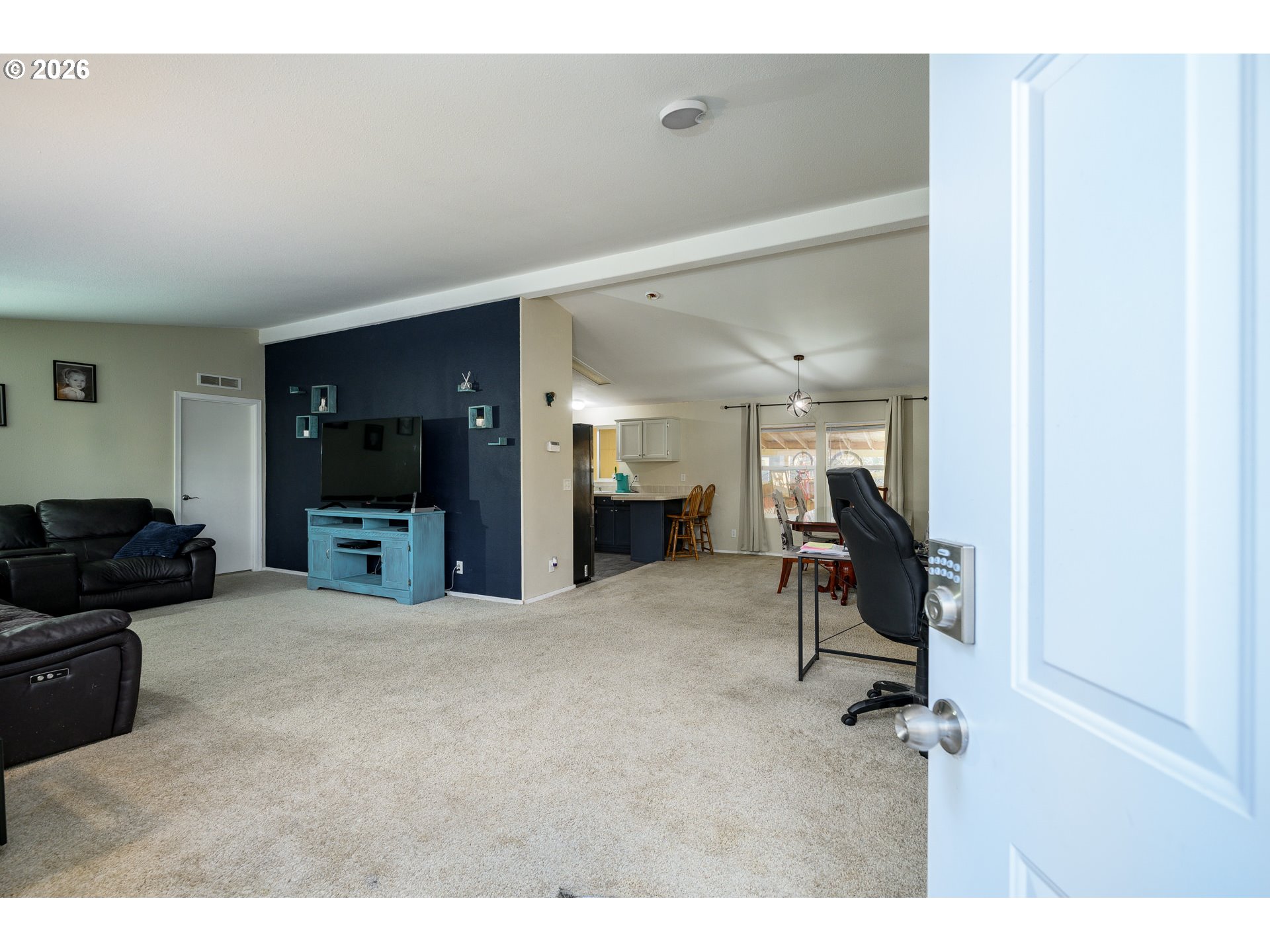 1282 3rd Street, Unit 83 Lafayette, OR 97127 - Photo 20 of 45 a view of a livingroom with furniture and a flat screen tv