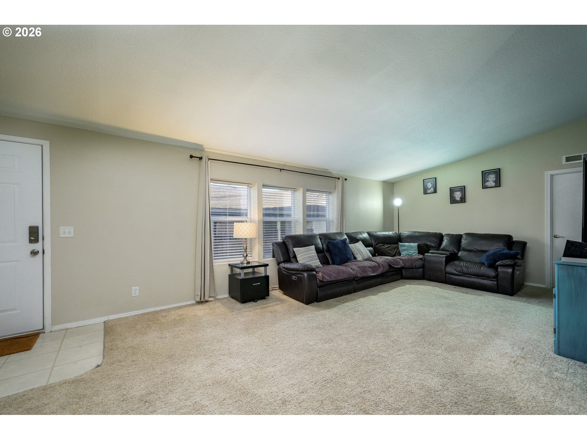 1282 3rd Street, Unit 83 Lafayette, OR 97127 - Photo 24 of 45 a living room with furniture and a large window