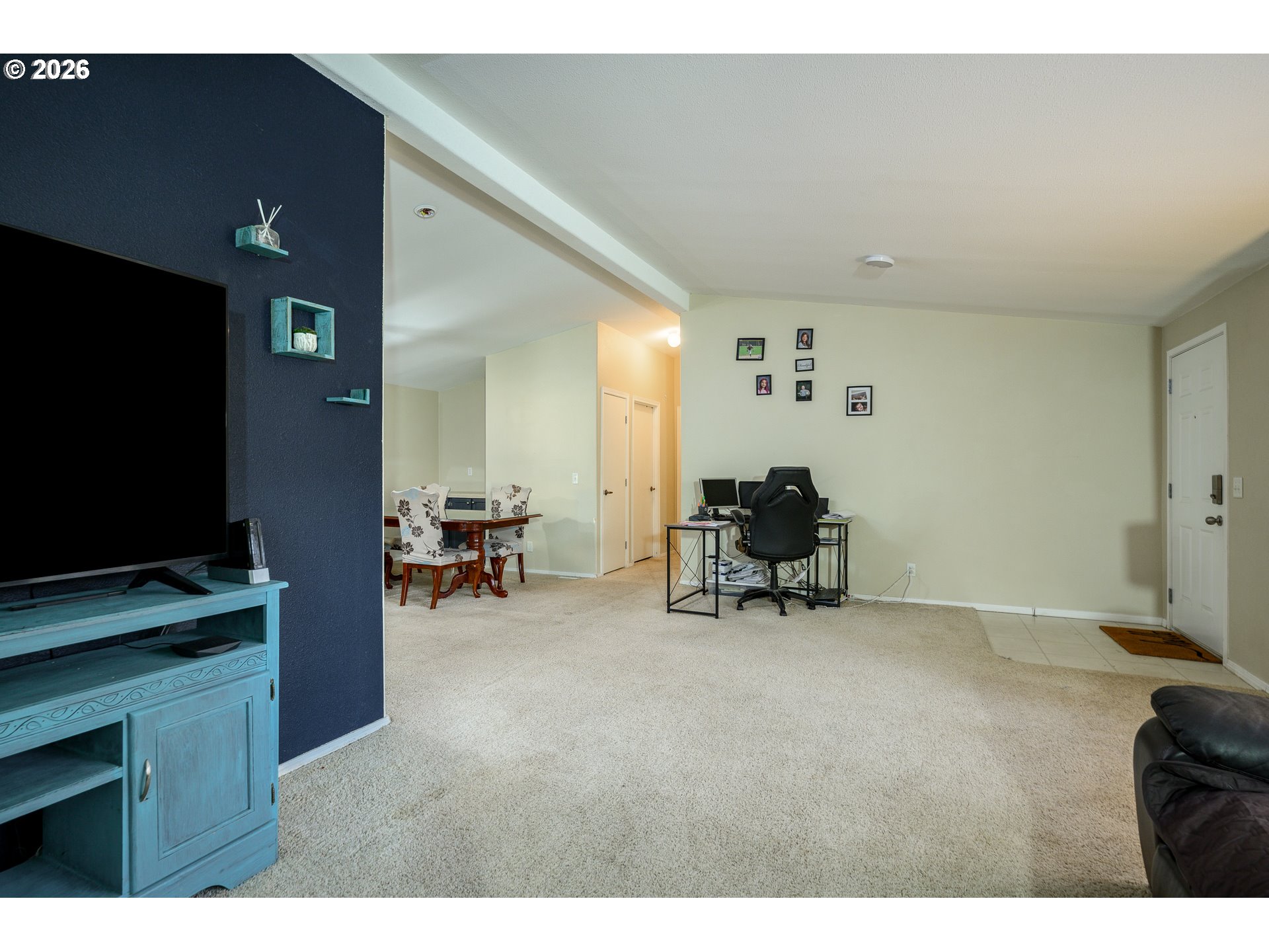 1282 3rd Street, Unit 83 Lafayette, OR 97127 - Photo 26 of 45 a living room with furniture and a flat screen tv