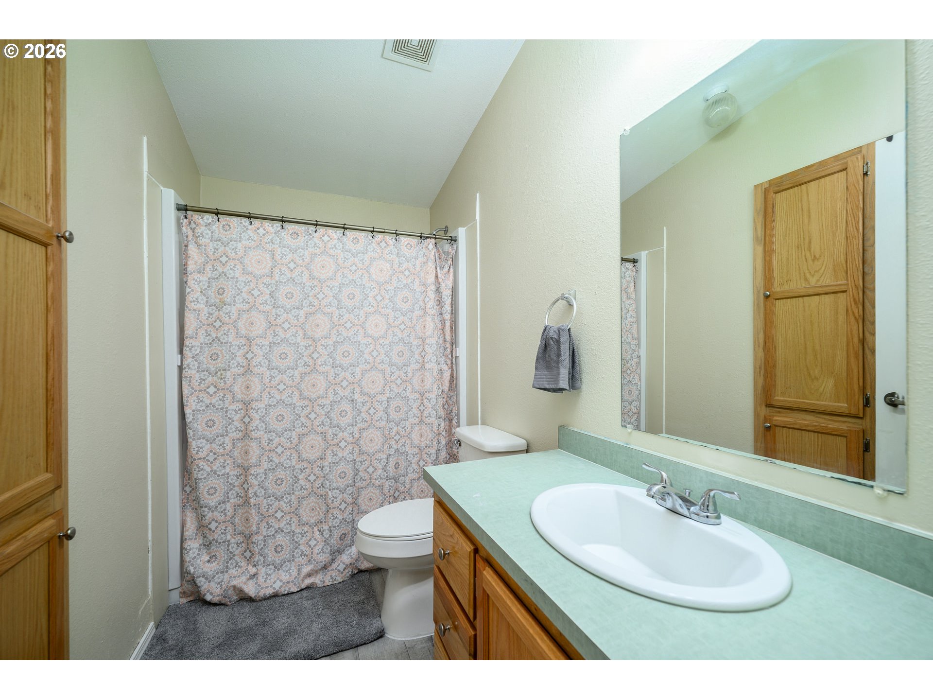 1282 3rd Street, Unit 83 Lafayette, OR 97127 - Photo 33 of 45 a bathroom with a sink toilet and shower