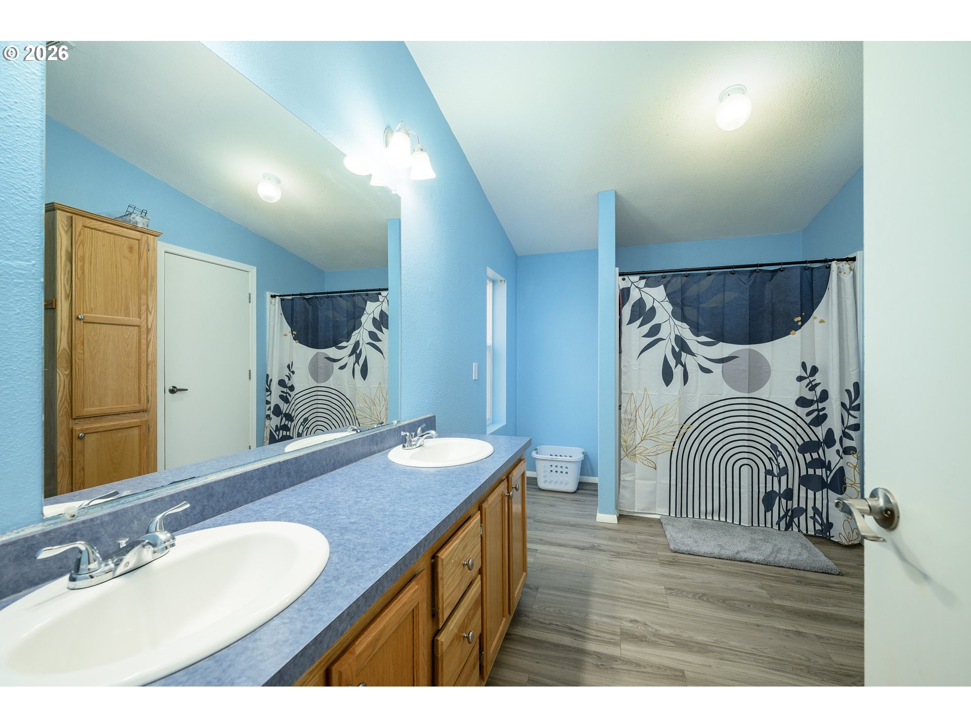 1282 3rd Street, Unit 83 Lafayette, OR 97127 - Photo 37 of 45 a bathroom with a sink and a mirror