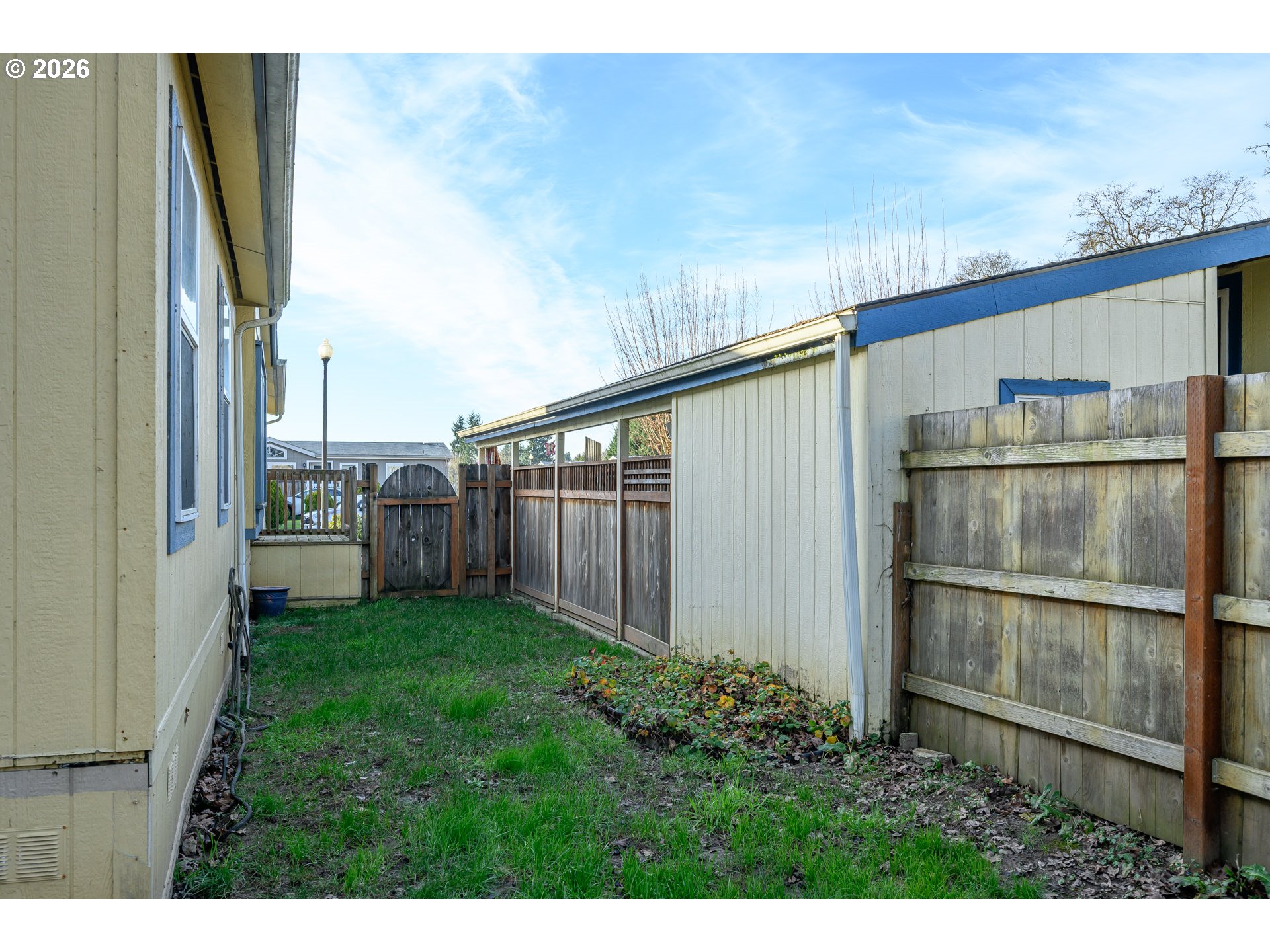 1282 3rd Street, Unit 83 Lafayette, OR 97127 - Photo 44 of 45 a view of a back yard from a balcony
