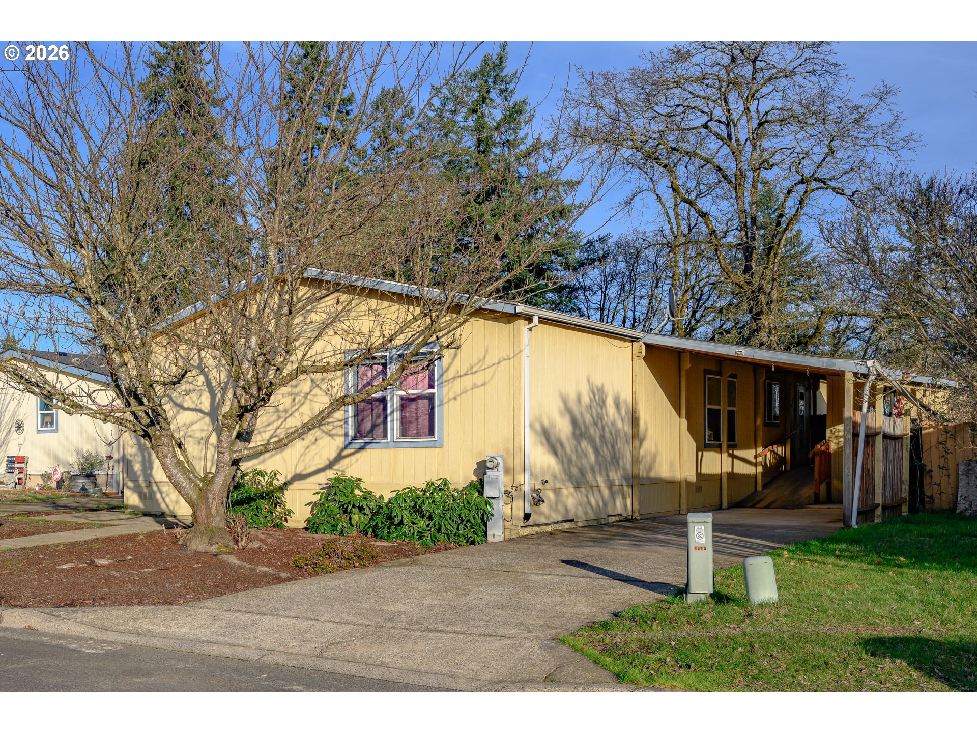 1282 3rd Street, Unit 83 Lafayette, OR 97127 - Photo 8 of 45 a backyard of a house with table and chairs