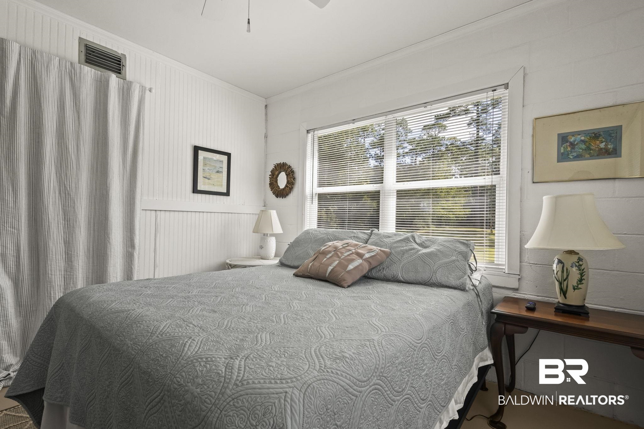 7849 Bayshore Drive Elberta, AL 36530 - Photo 27 of 47 Bedroom featuring crown molding and ceiling fan