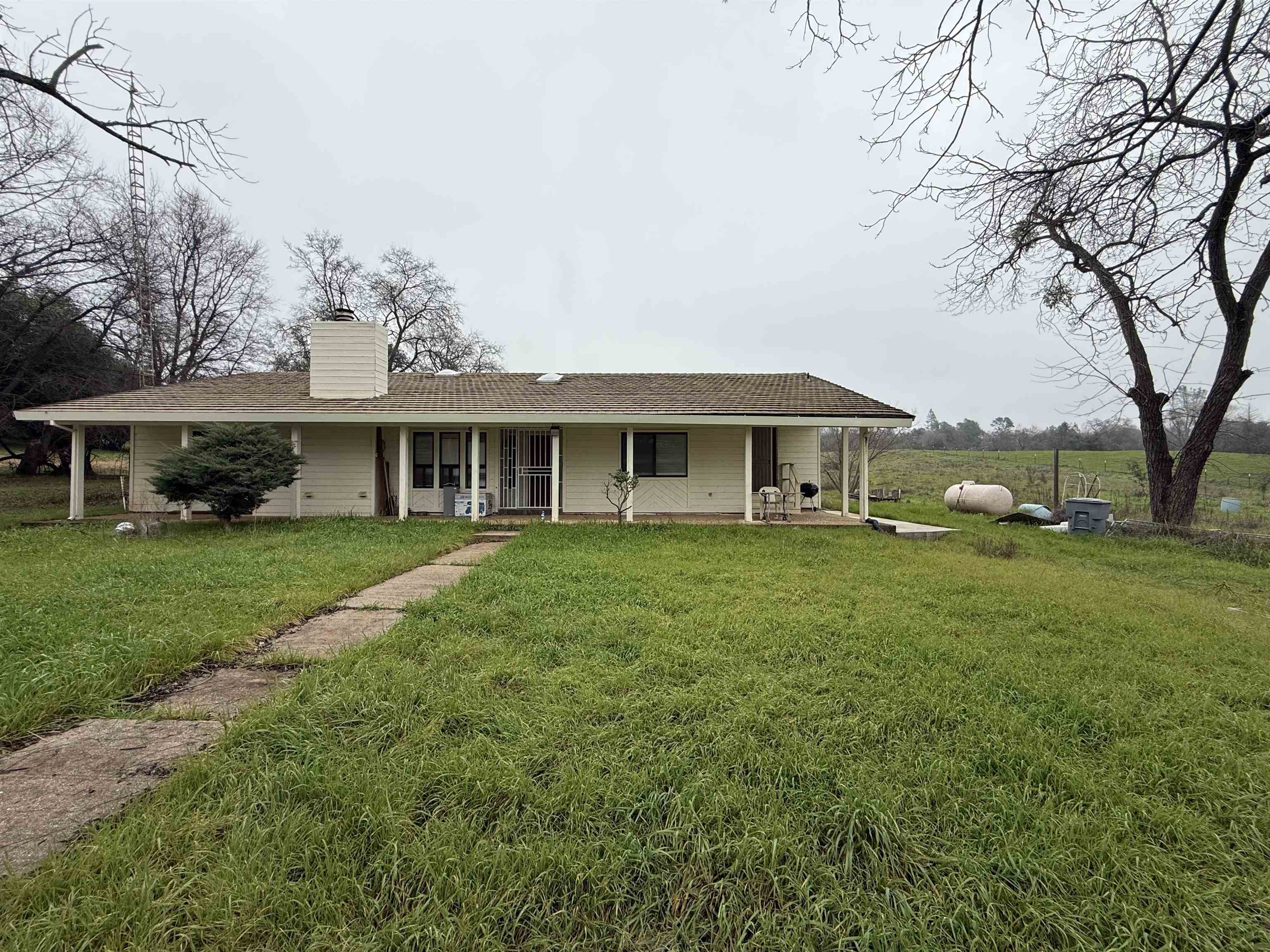 front view of a house with a yard
