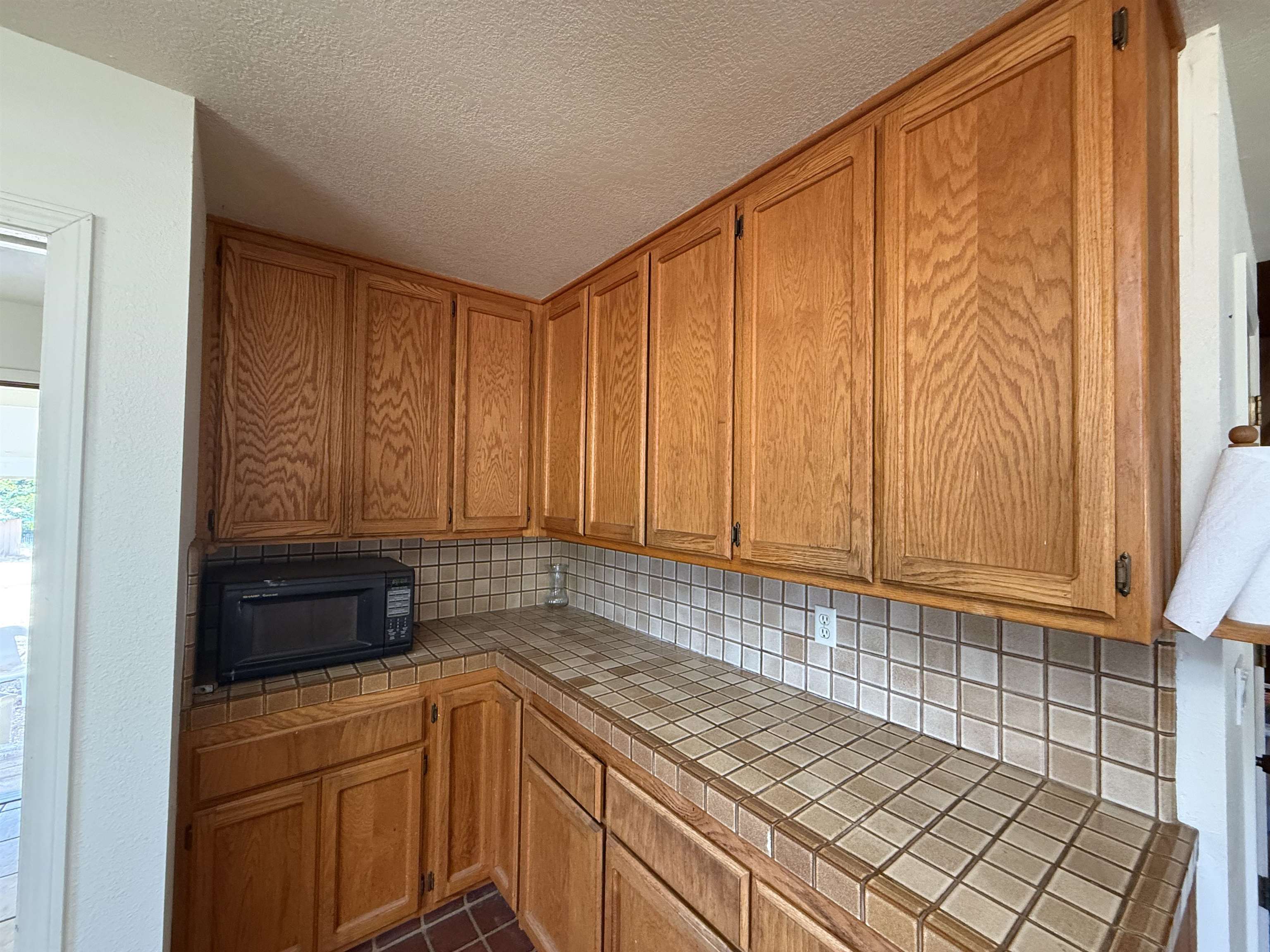 5893 Fruitland Road Marysville, CA 95901 - Photo 11 of 35 a kitchen with a sink and cabinets