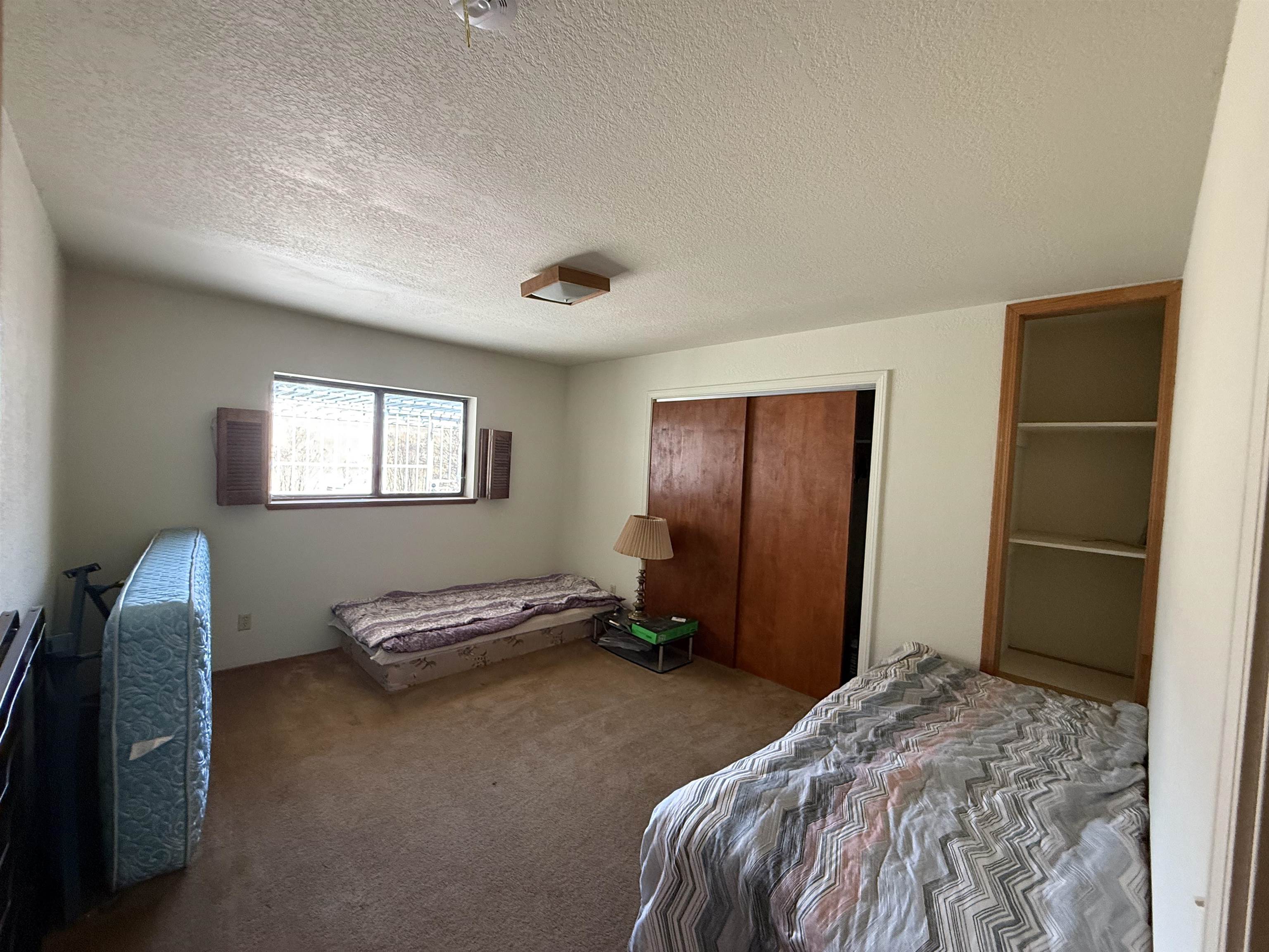 5893 Fruitland Road Marysville, CA 95901 - Photo 15 of 35 a bedroom with a bed and a window