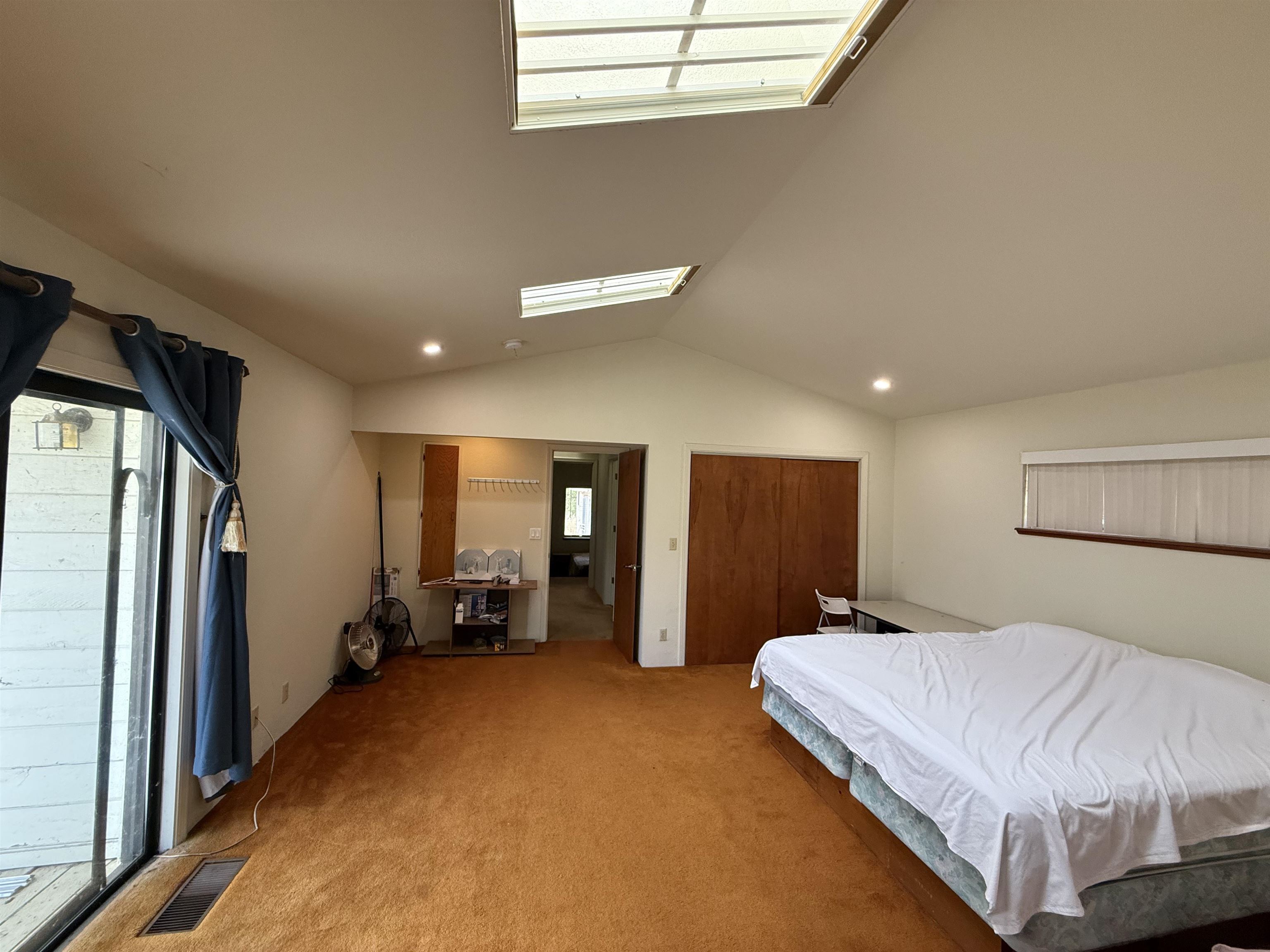 5893 Fruitland Road Marysville, CA 95901 - Photo 19 of 35 a bedroom with a bed and dresser with mirror