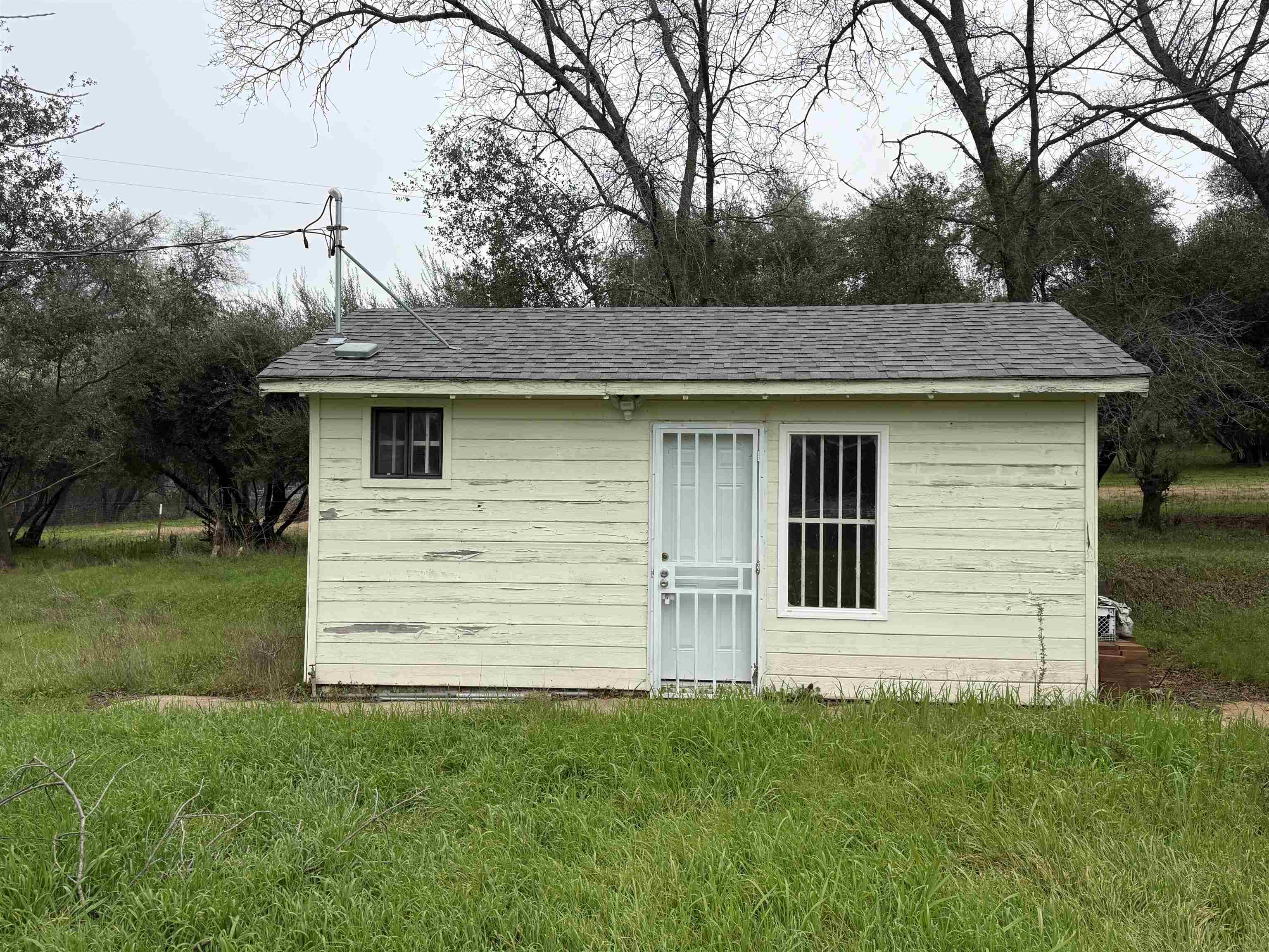 5893 Fruitland Road Marysville, CA 95901 - Photo 25 of 35 a view of a house with a backyard