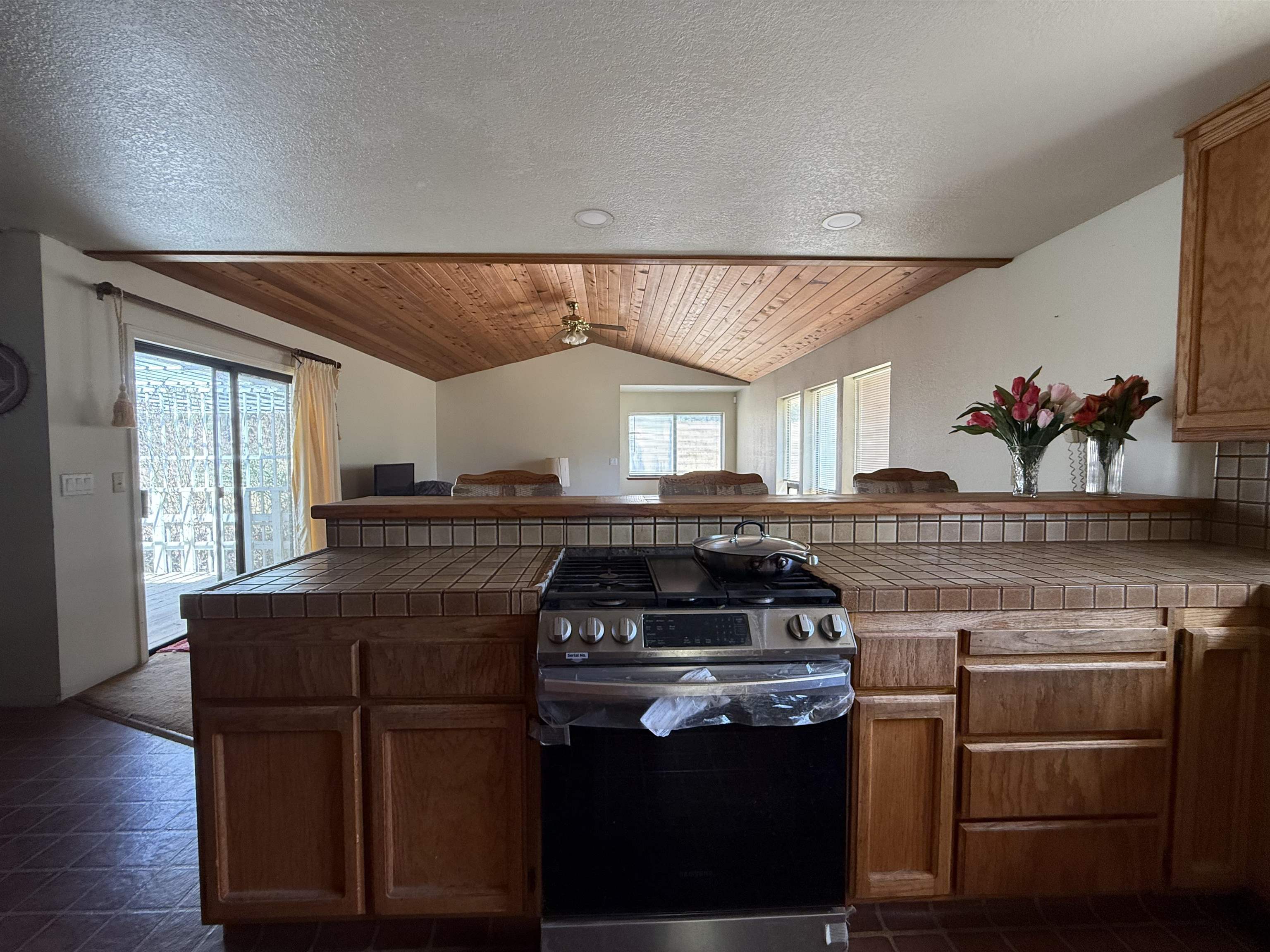 5893 Fruitland Road Marysville, CA 95901 - Photo 7 of 35 a kitchen with a stove and cabinets