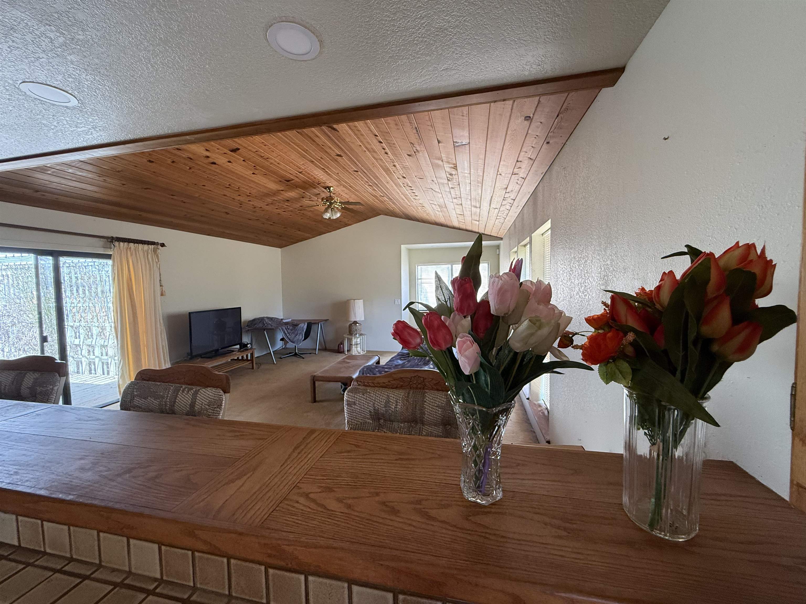 5893 Fruitland Road Marysville, CA 95901 - Photo 8 of 35 a living room with furniture flowers and wooden floor