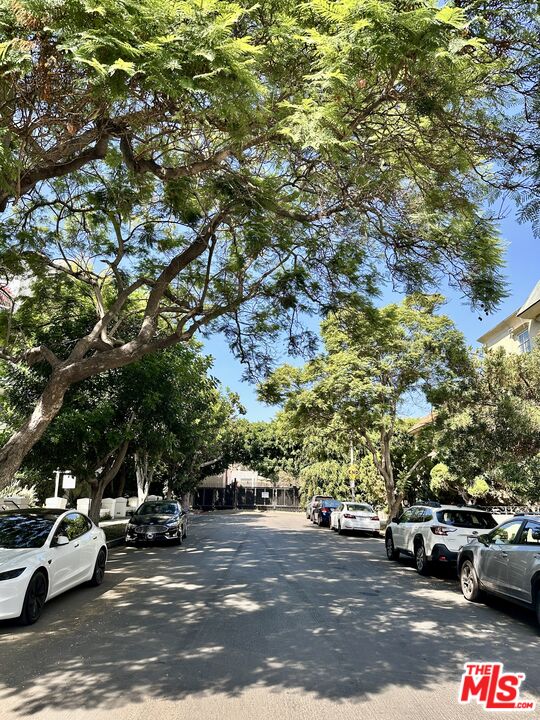 1401 South Bentley Avenue, Unit 202 Los Angeles, CA 90025 - Photo 32 of 32 a view of street with parked cars