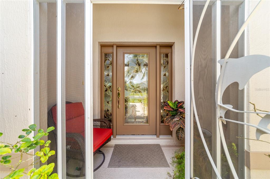 16369 Southwest 14th Avenue Road Ocala, FL 34473 - Photo 6 of 49 a view of a hallway with wooden floor and stairs