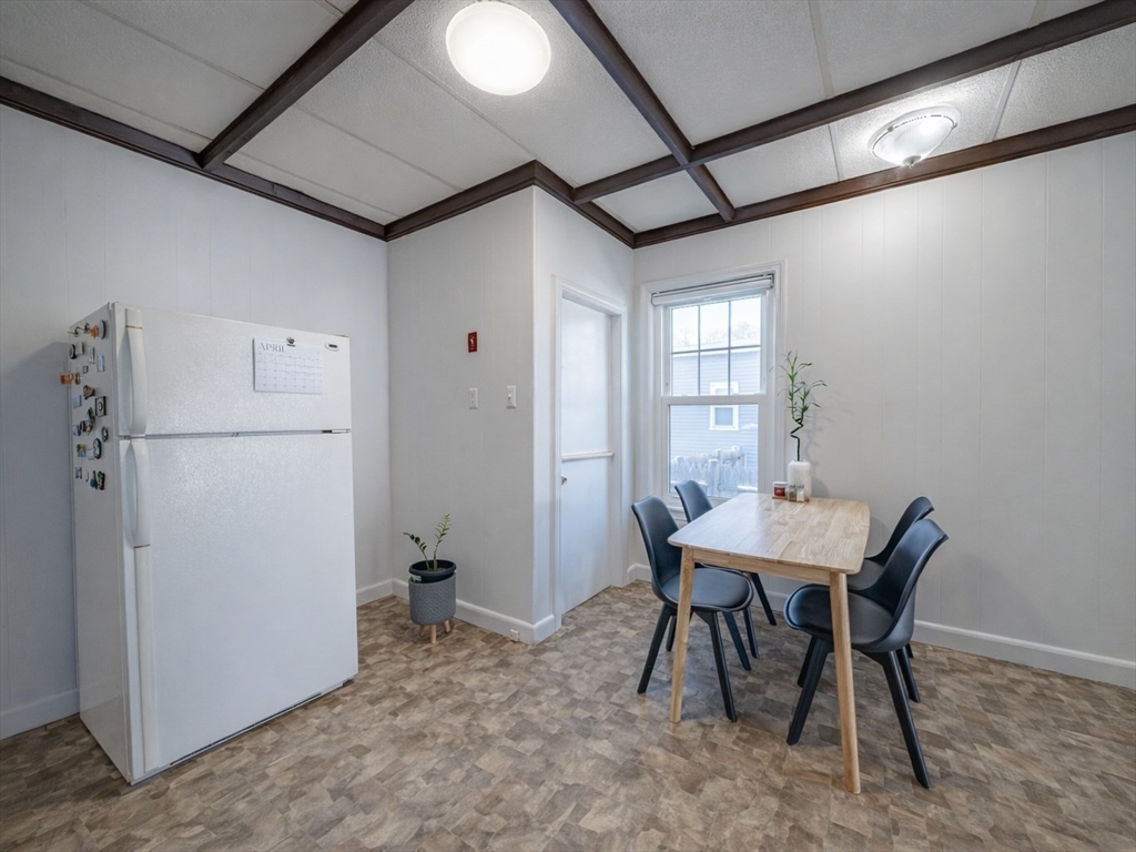 10 Guild Road Saugus, MA 01906 - Photo 13 of 32 a view of a dining room with furniture