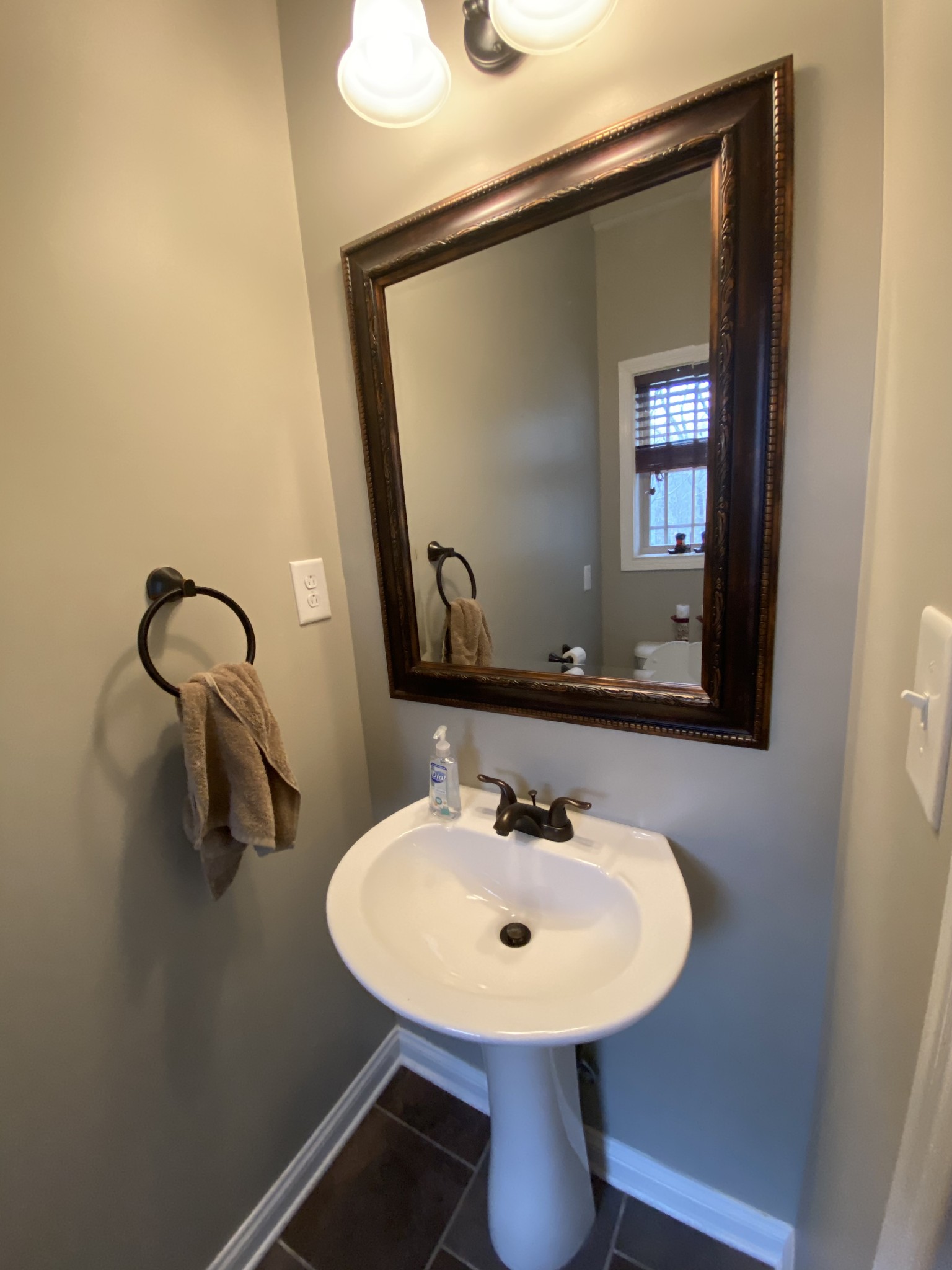 1652 Gratton Road Clarksville, TN 37043 - Photo 22 of 25 a bathroom with a sink and a mirror