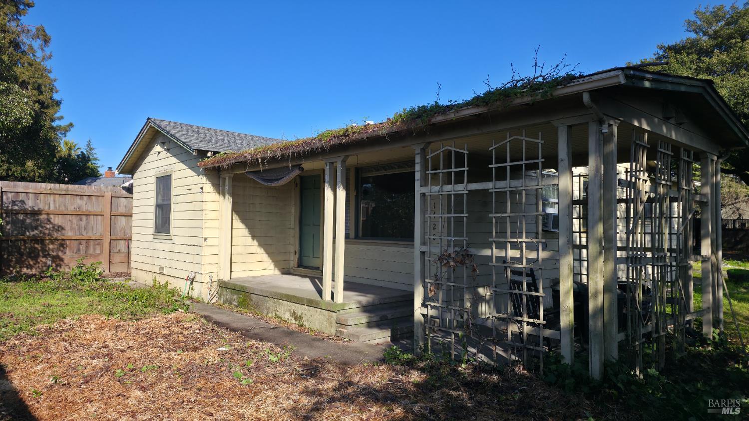 1420 Fulton Road Santa Rosa, CA 95403 - Photo 2 of 17 a front view of a house with a yard
