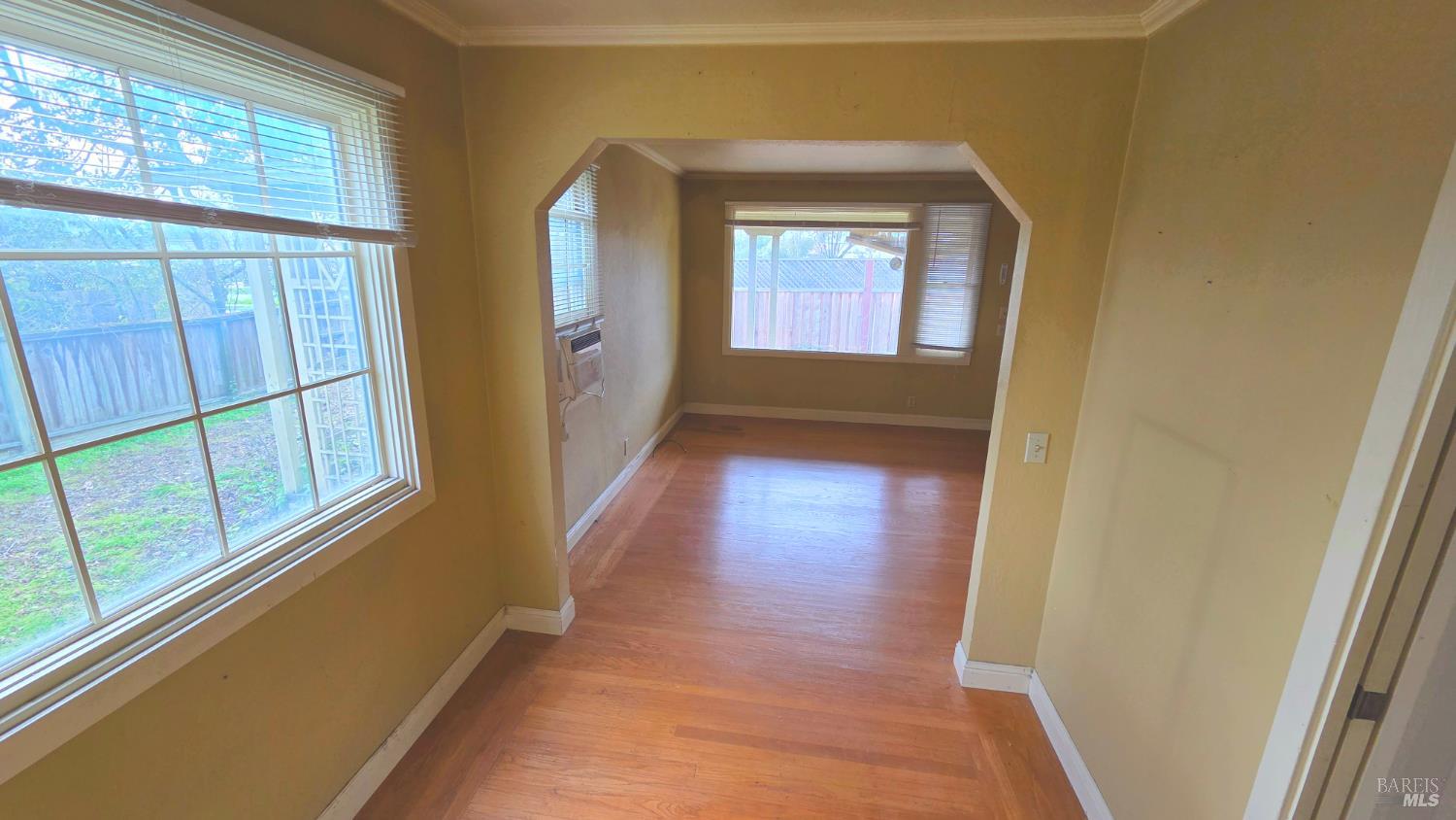 1420 Fulton Road Santa Rosa, CA 95403 - Photo 5 of 17 a view of a hallway with wooden floor and stairs