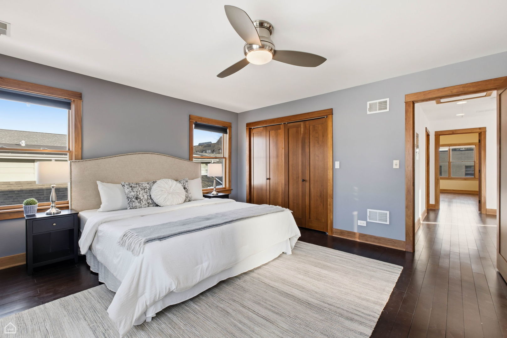 3814 North Mozart Street Chicago, IL 60618 - Photo 27 of 37 a bedroom with a bed and wooden floor