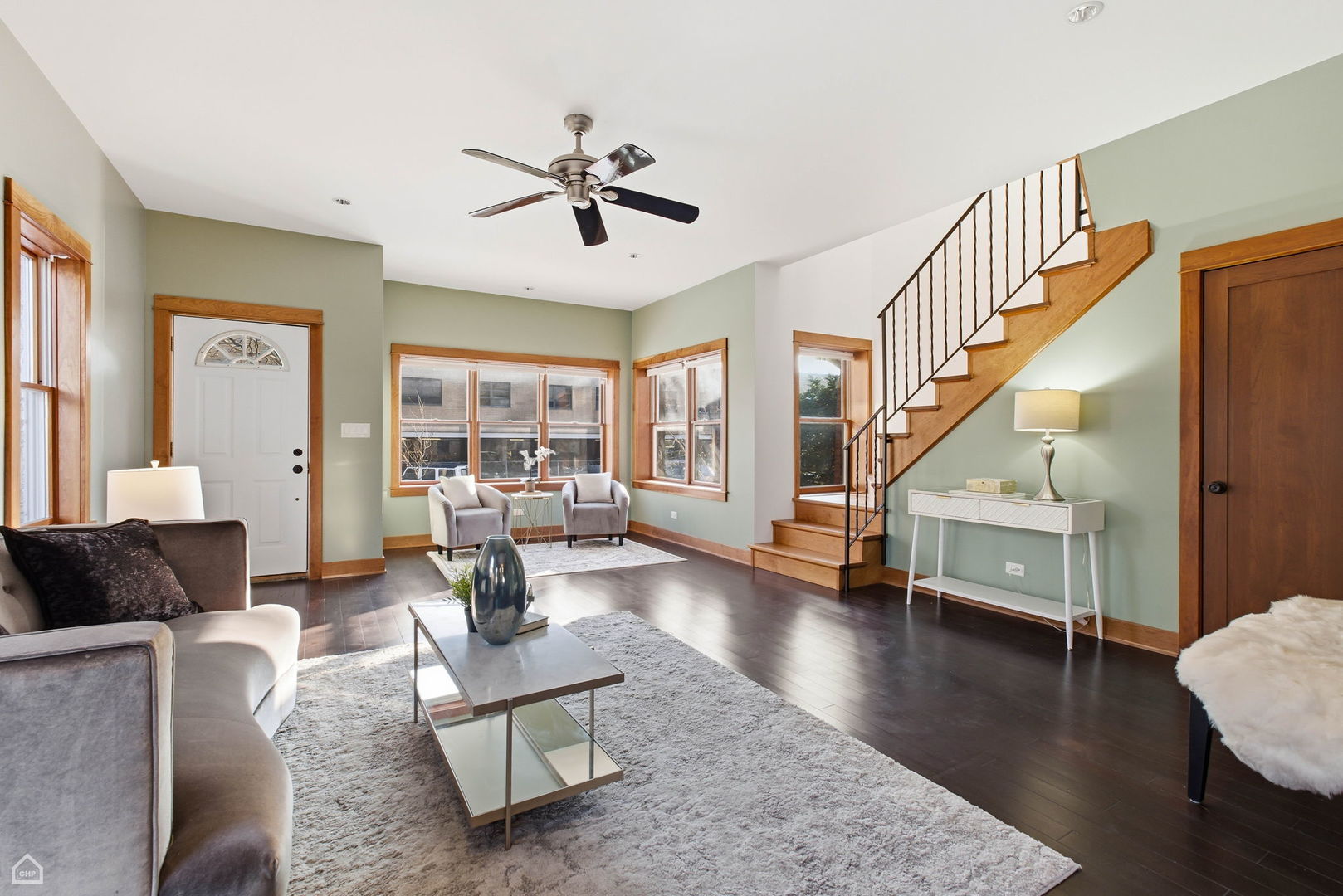 3814 North Mozart Street Chicago, IL 60618 - Photo 6 of 37 a living room with furniture and wooden floor