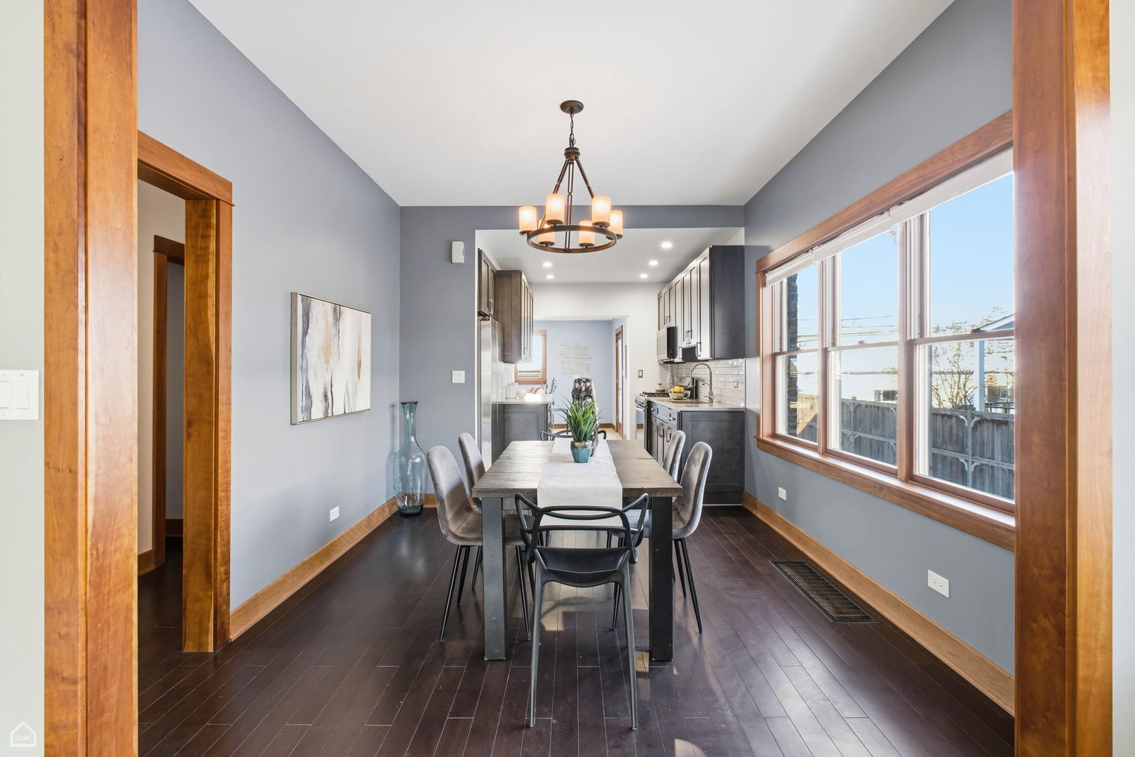 3814 North Mozart Street Chicago, IL 60618 - Photo 10 of 37 a view of a dining room with furniture window and wooden floor