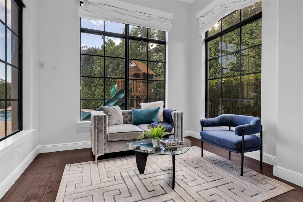 6915 Long Leaf Drive Parkland, FL 33076 - Photo 29 of 80 a living room with furniture and a large window