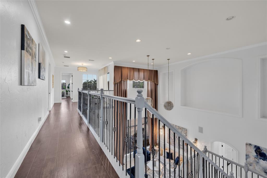 6915 Long Leaf Drive Parkland, FL 33076 - Photo 31 of 80 a view of a hallway with wooden floor and stairs