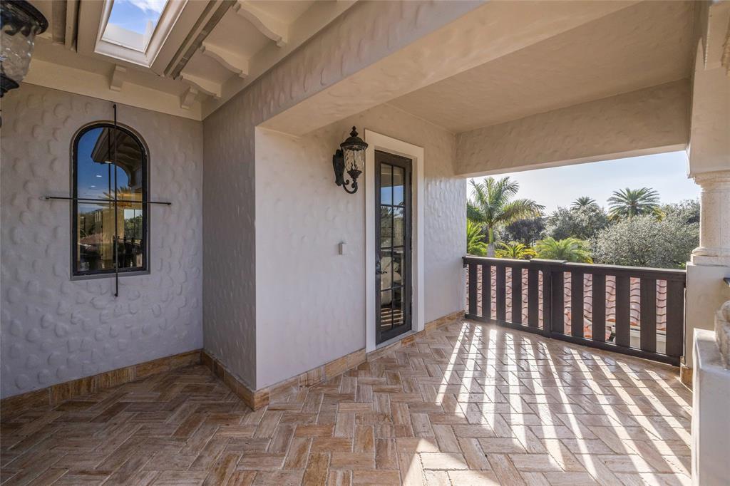 6915 Long Leaf Drive Parkland, FL 33076 - Photo 35 of 80 a view of balcony with wooden floor and windows