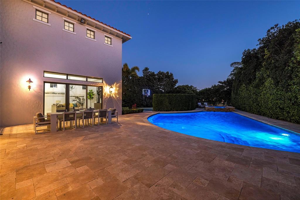 6915 Long Leaf Drive Parkland, FL 33076 - Photo 41 of 80 a view of a swimming pool with lawn chairs and a yard