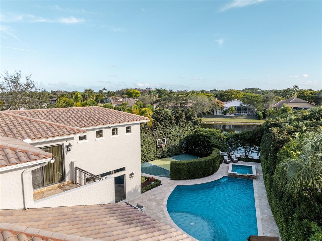 6915 Long Leaf Drive Parkland, FL 33076 - Photo 77 of 80 a view of a terrace with a bench