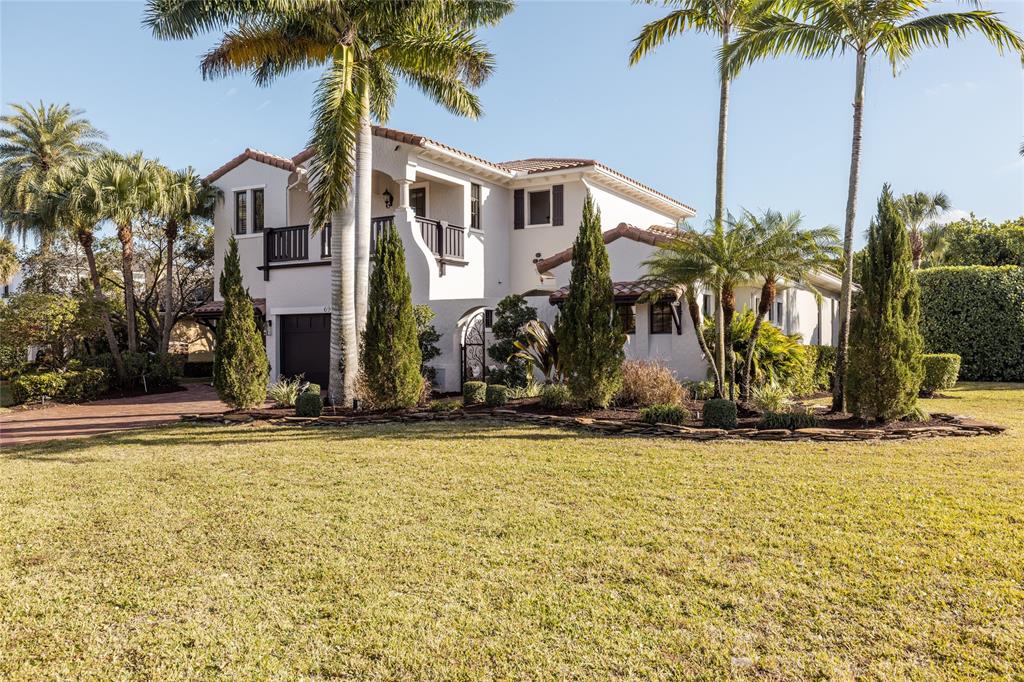 6915 Long Leaf Drive Parkland, FL 33076 - Photo 10 of 80 a front view of multiple house with palm trees