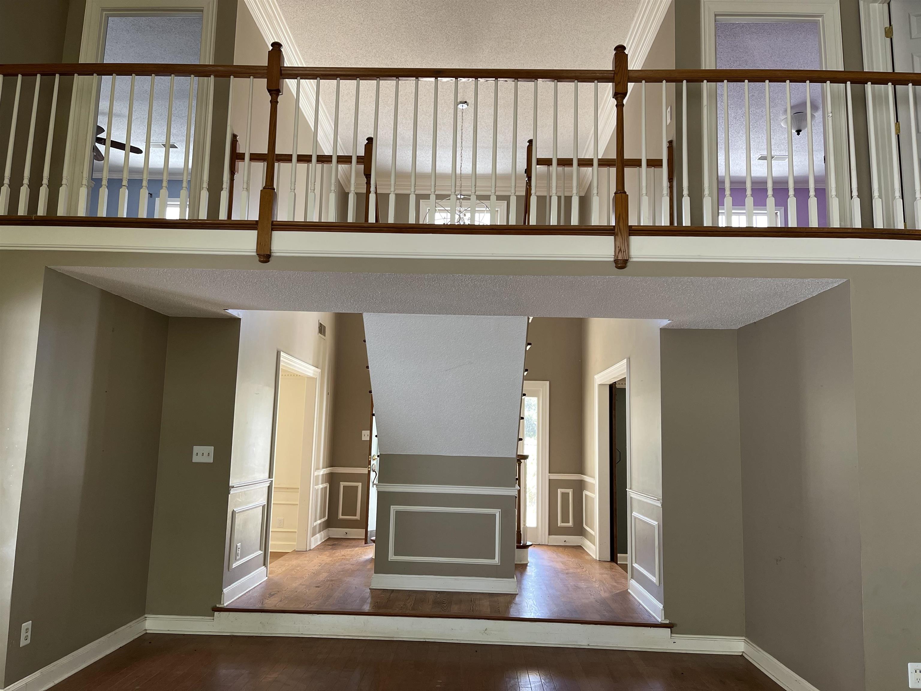 9220 Davies Plantation Road Bartlett, TN 38133 - Photo 3 of 19 Great room view with crown molding, a textured ceiling, and hardwood / wood-style floors
