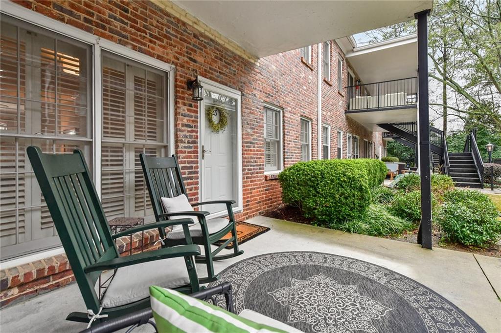 3675 Peachtree Road Northeast, Unit 23 Atlanta, GA 30319 - Photo 1 of 1 a view of a chair and table in the patio