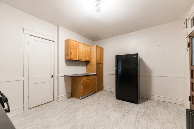 a kitchen with stainless steel appliances a refrigerator and a sink