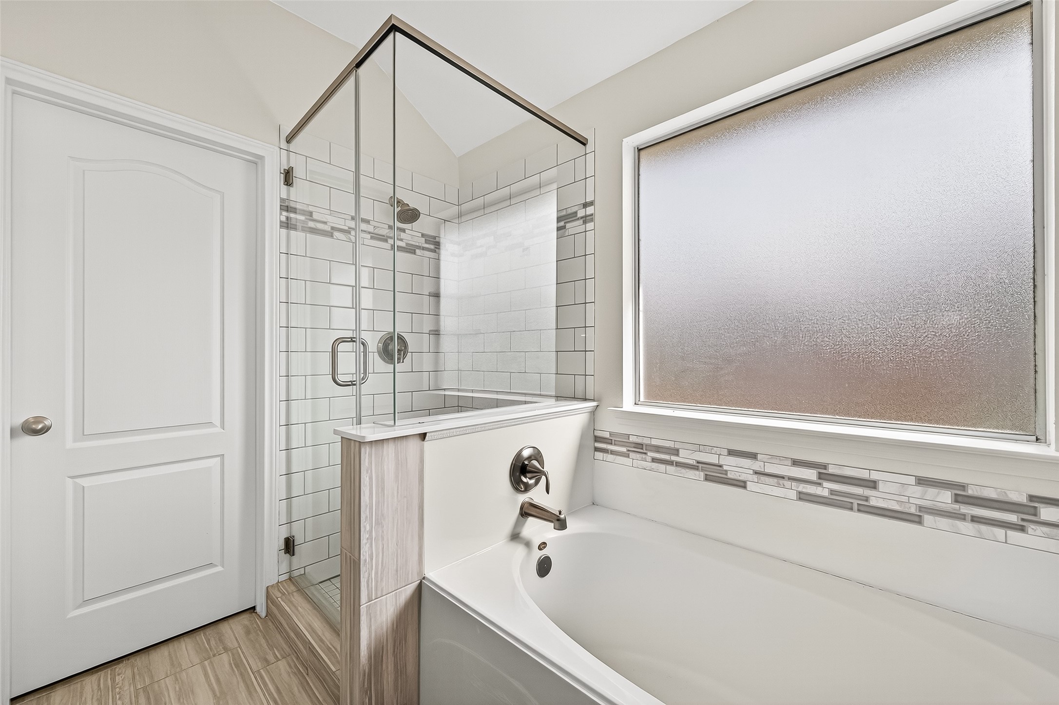 3114 Sabine Spring Lane Katy, TX 77449 - Photo 21 of 34 a bathroom with a bathtub and a shower