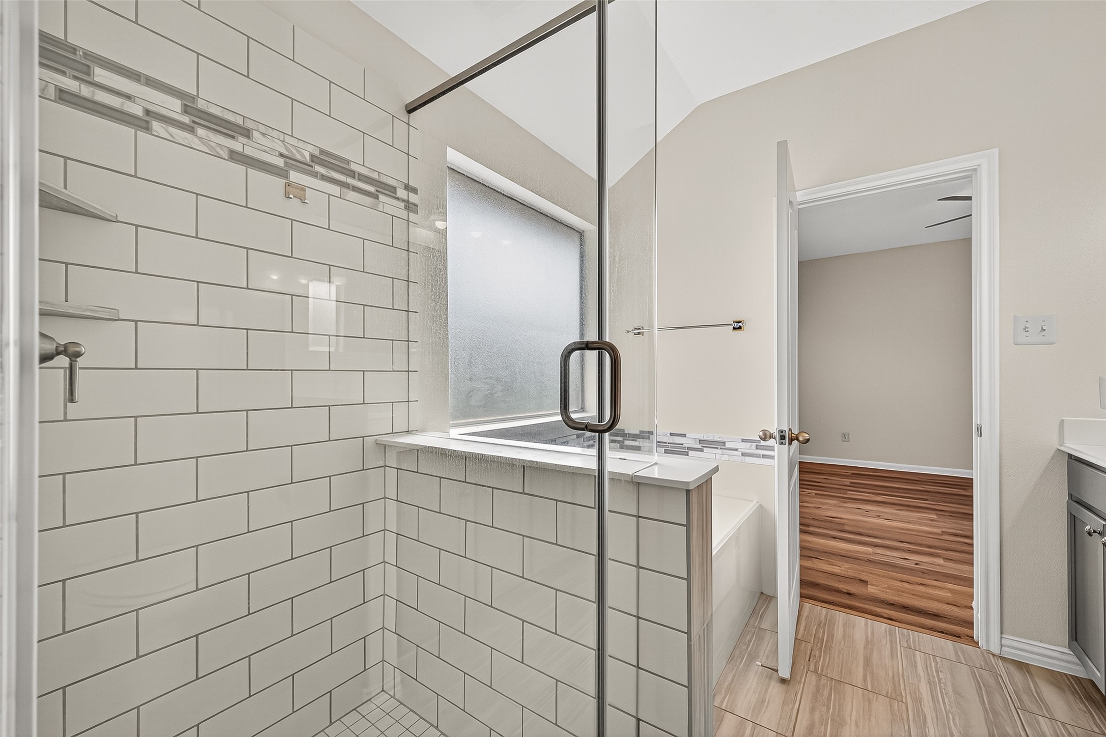 3114 Sabine Spring Lane Katy, TX 77449 - Photo 24 of 34 a bathroom with a sink shower and a mirror