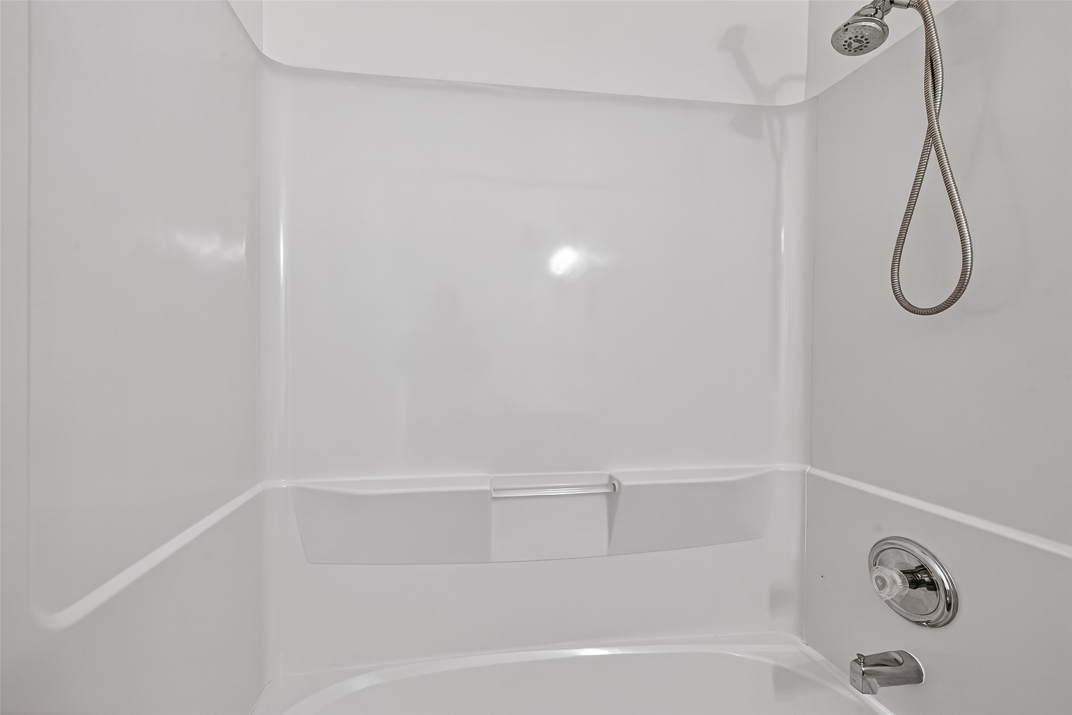 3114 Sabine Spring Lane Katy, TX 77449 - Photo 28 of 34 a bathroom with a bath tub with a shower