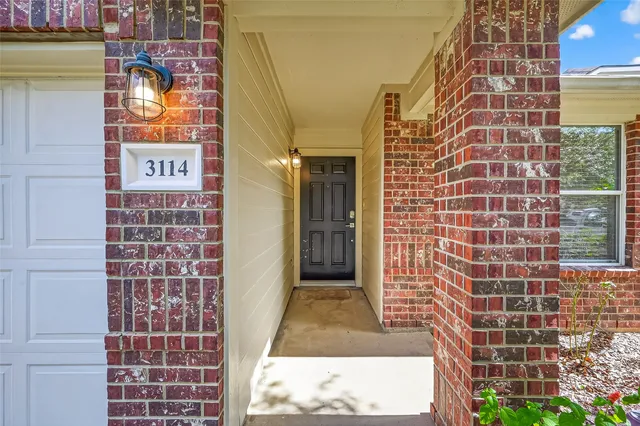 a view of a brick buildings with entryway