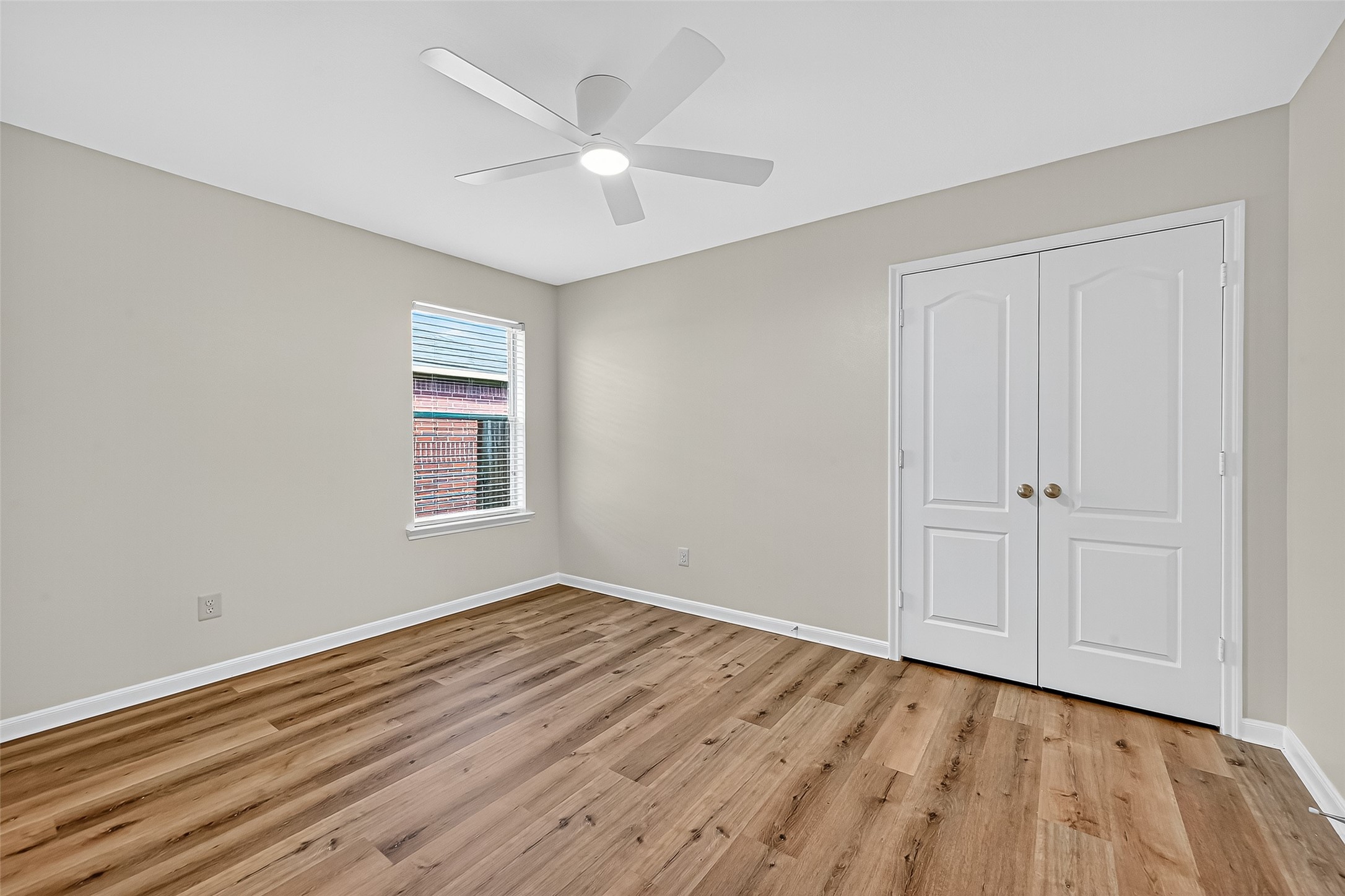 3114 Sabine Spring Lane Katy, TX 77449 - Photo 32 of 34 a view of an empty room with wooden floor