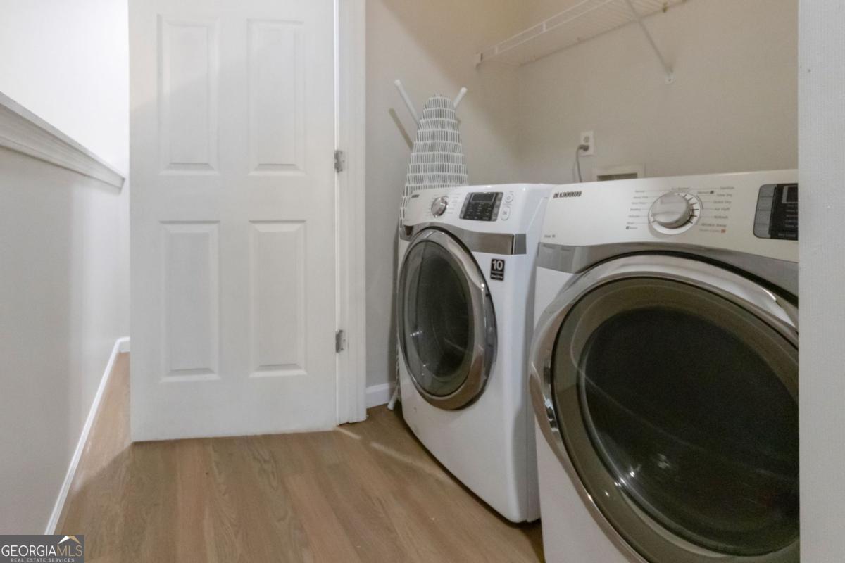5920 Seabright Lane Atlanta, GA 30349 - Photo 11 of 18 a utility room with dryer and washer